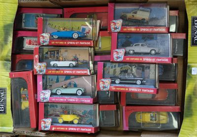 a lot of toy cars that are in a box