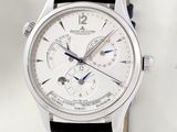 a close up of a wrist watch with a white dial