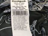 black and white floral print dress with a price tag on it