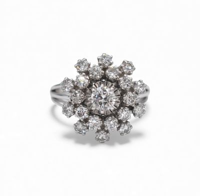 a close up of a diamond ring on a white background