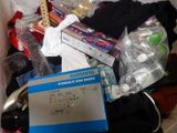 a box full of items that are sitting on the floor