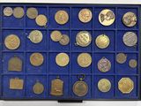 a display case with a lot of coins in it