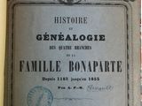 un vieux livre posé sur une table recouverte de papiers