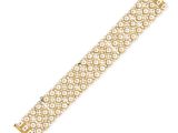 a diamond and eighteen karat gold bracelet