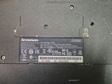a close up of a laptop with a label on it