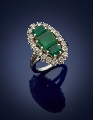 an emerald and diamond ring