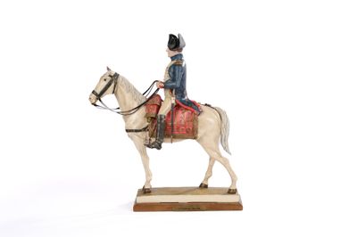 une figurine représentant un homme à cheval