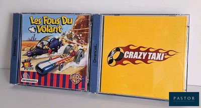 two cd ' s are sitting side by side on a white surface