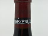 a bottle of wine that is sitting on a table
