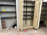 two open cabinets in a garage with a bag on the floor
