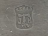 a close up of a metal plate with a logo on it