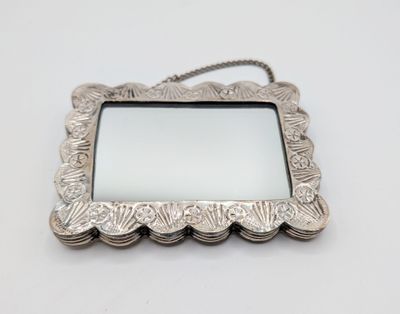 silver plated picture frame with scallop edge and chain