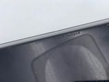 a close up of a cell phone on a table