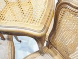 two chairs that are sitting next to each other