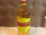 a bottle of liquor sitting on a table
