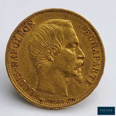 l'image d'une pièce d'or sur laquelle figure le visage d'un homme