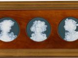 three framed images of two women in profile, one in profile and the other in profile