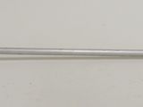 a close up of a metal object on a white surface