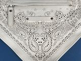 an image of a white purse with a zipper on it