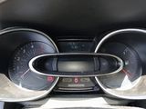 a close up of a car dashboard with a speedometer and gauges