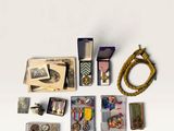 a lot of items that are laying out on the table