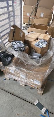 many boxes on a pallet in a warehouse