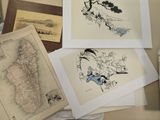many different pictures of a map on a table
