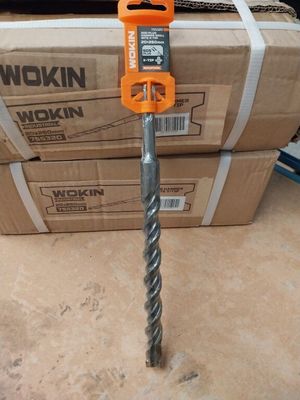a close up of a drill head on a box