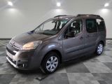 grey citrole van parked in a showroom with checkered floor
