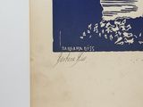 a blue and white book with a picture of a man on a boat