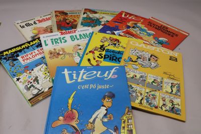 many children ' s books that are on the table