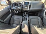 a view of the interior of a car from the driver ' s seat