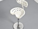 an image of a white chair with polka dots on it