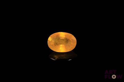 a close up of a yellow moon in the dark sky