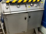 une machine qui se trouve dans le coin d'une pièce