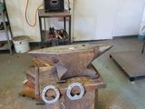 a wooden box with a pair of scissors on top of it