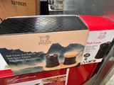 boxes of coffee are stacked on top of each other in a store