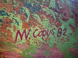 graffiti on the side of a wall with a name painted on it