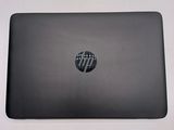 a black laptop with a black hp logo on the screen