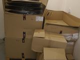 a pile of cardboard boxes stacked on top of each other