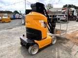 a yellow machine that is sitting in the dirt