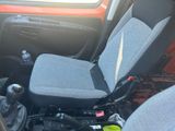 a car seat with a cup holder in it