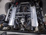 an overhead view of a car ' s engine bay with the top down