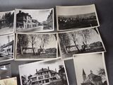 several old black and white photos of a street and buildings