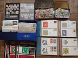 many different types of stamps on the table