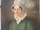 portrait d'une femme en robe verte et à la coiffe