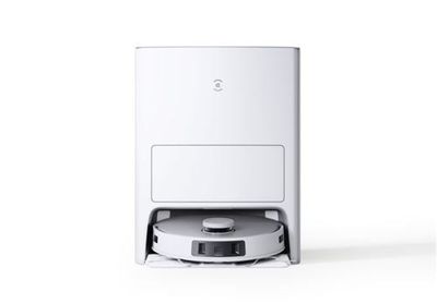 une image d'un aspirateur robotisé sur une surface blanche