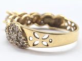an image of a close up of a ring on a white surface