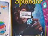 a box of splendor and a card game on a table