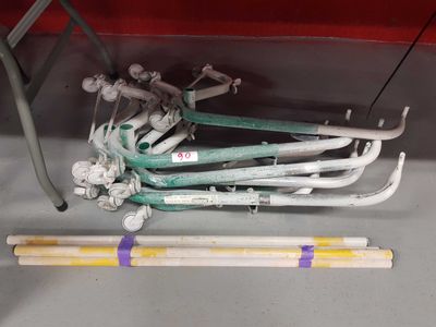 a lot of pipes that are sitting on the floor